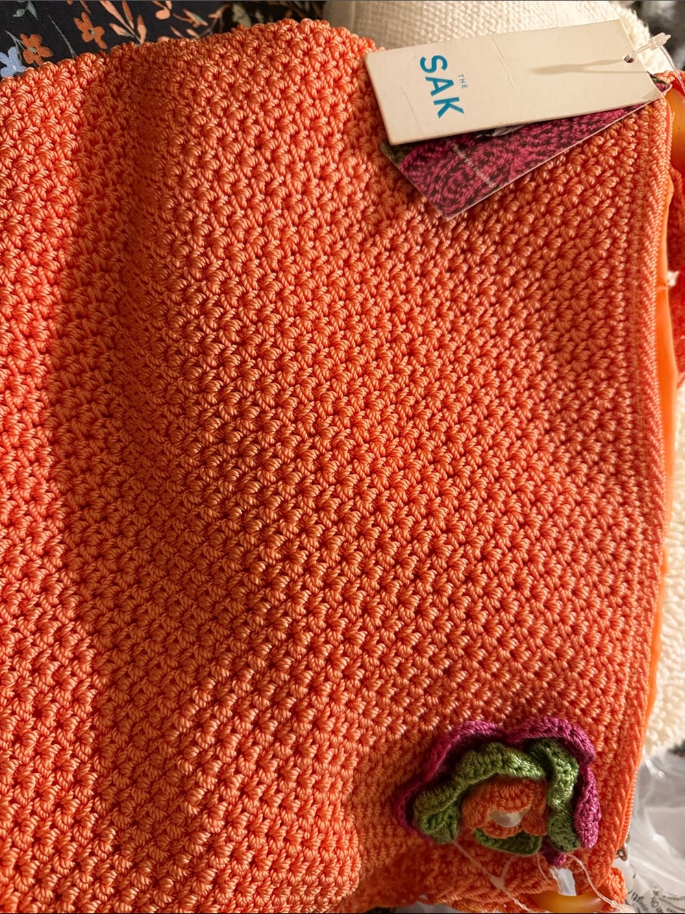 The Sak Orange Crochet Sweater with Multicolor Floral Trim